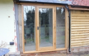 34. Fully glazed door set . 1 x fully glazed door and frame with two fully glazed lights