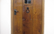5. Roman oak antique solid oak door with a window £750.00+vat Frame £450.00+vat 27mm planks and 32mm ledges. Picture No 8 showing back of the door.