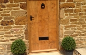 1. Natural finish Antique solid oak door  price £700.00+vat Frame £375.00+vat 27mm planks and 32mm ledges. Picture No 8 showing back of the door. Door with planted on frame at the back £800+vat.  see pic No13. Door thickness 48-50mm