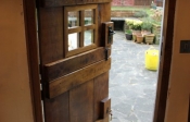 10.A stable antique glazed door inside