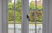Sapele double opening casement window with horizontal and vertical bars