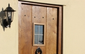 4. Solid Oak 3 Plank Light Antique External door with window £900.00+vat and frame £525.00+vat 27mm planks and 32mm ledges. Picture No 8 showing back of the standard antique ledged door. Door (with window) with planted on frame at the back £950+vat see pic No13. Door thickness 48-50mm